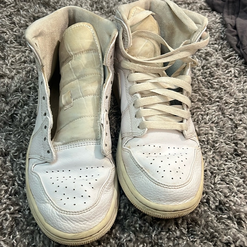 White Nike Jordans mid